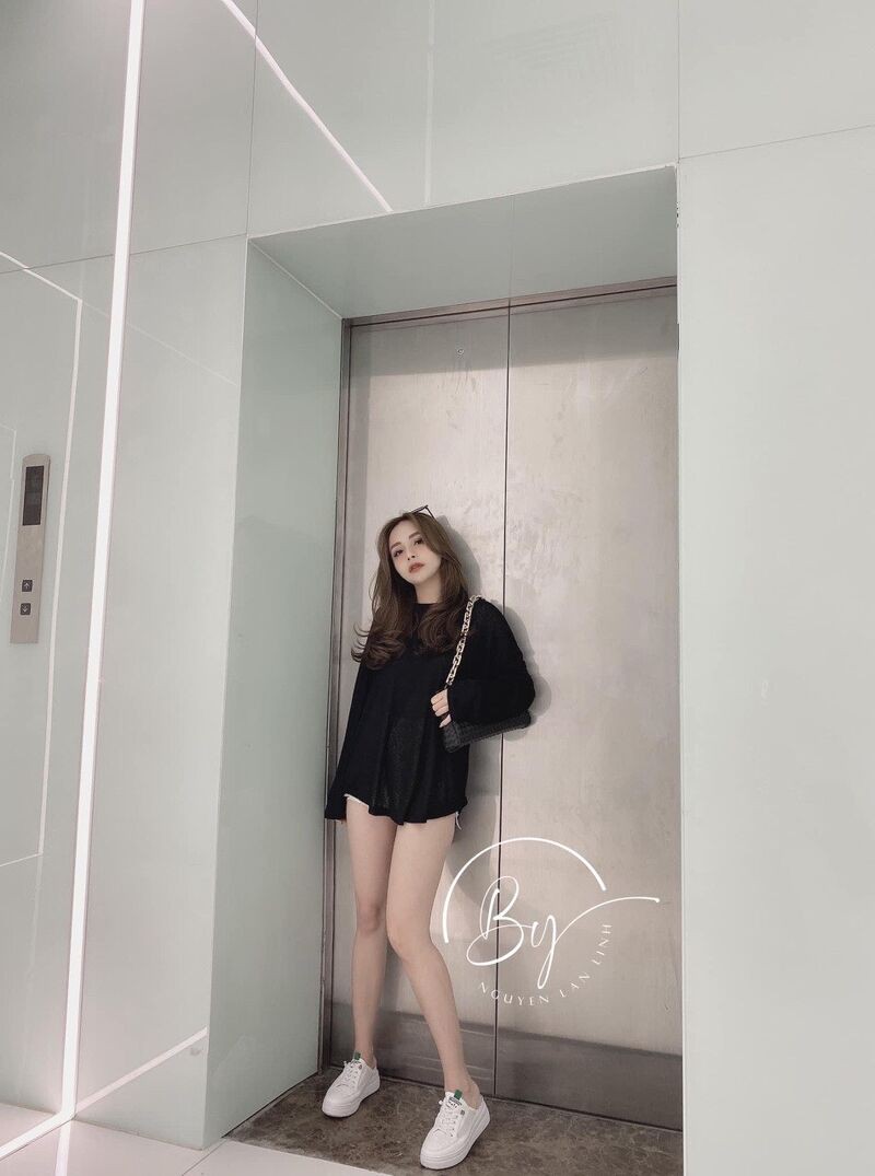Áo thun dây xích đan lưng tay lỡ 
