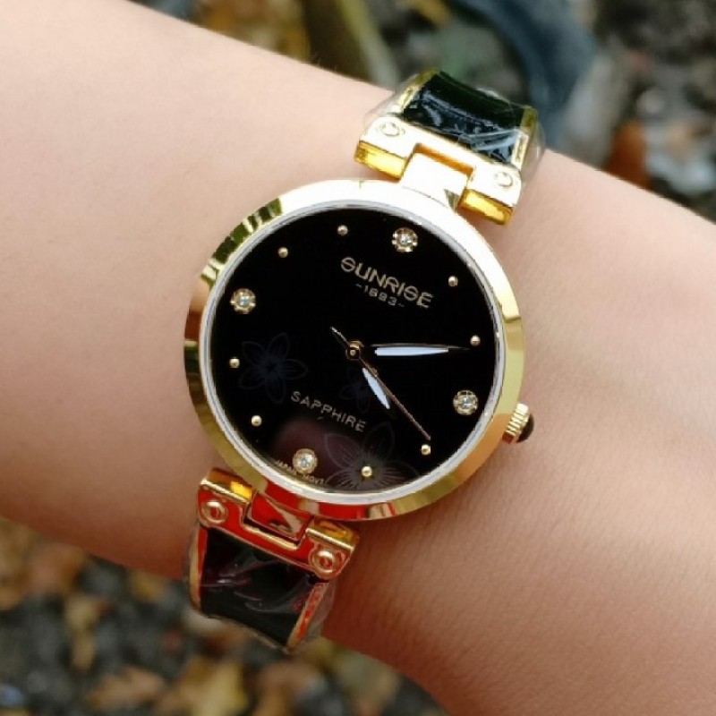 Đồng hồ lắc tay nữ SUNRISE 9991SA dây vàng mặt đen, kính sapphire chống trầy xước, chống nước tốt