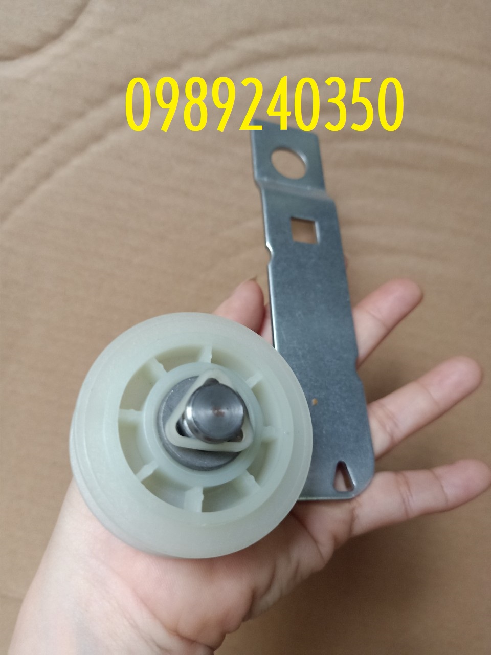 Bánh tỳ căng dây curoa máy sấy Whirlpool