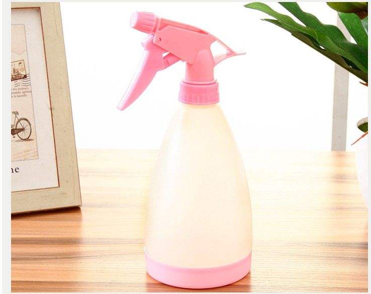 Multifunctional handheld spray bottle