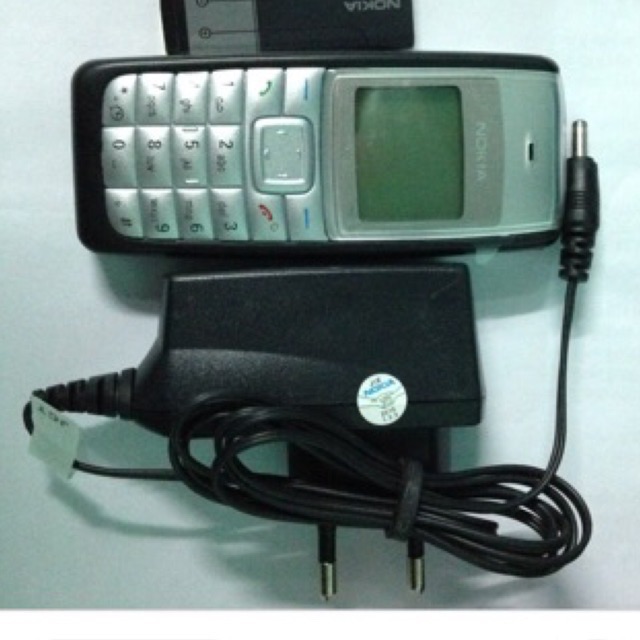 Xạc Nokia 110i chân tròn to