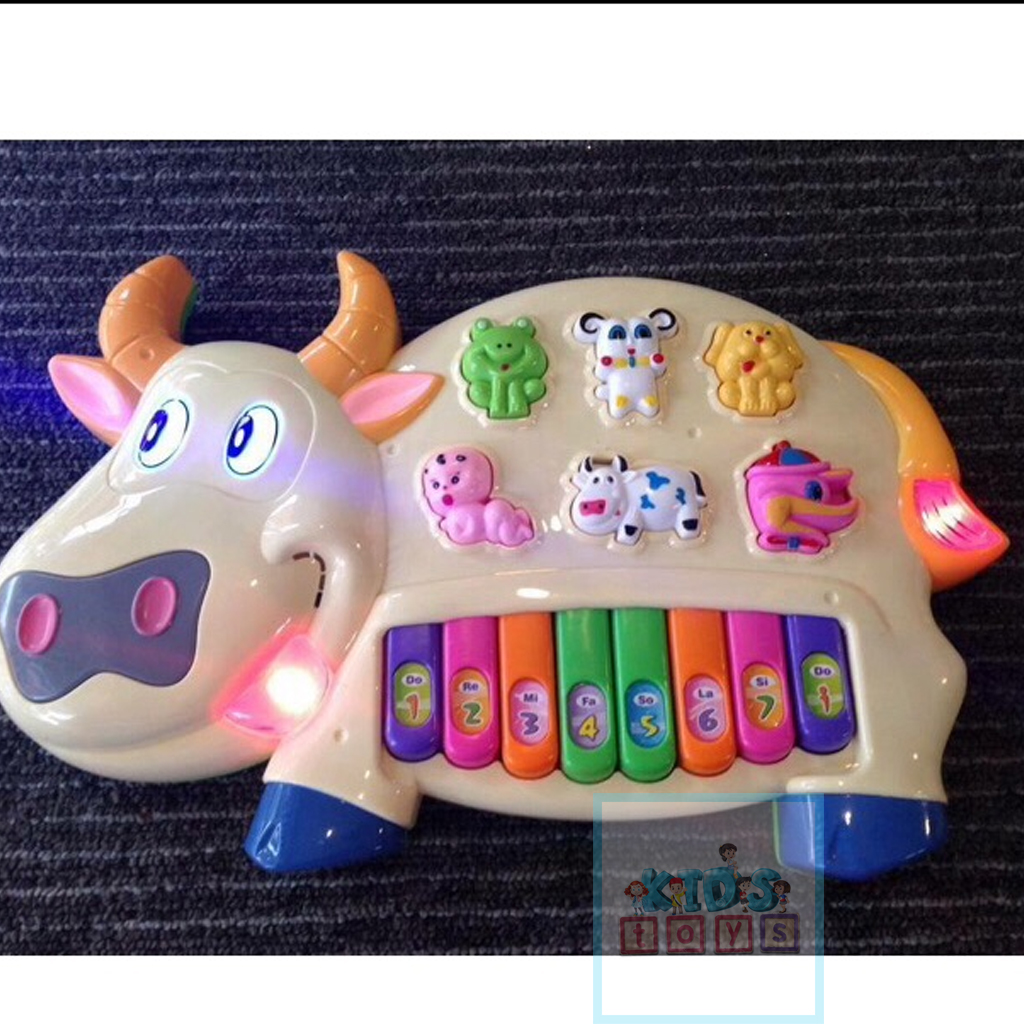 Đàn piano cho bé hình bò sữa