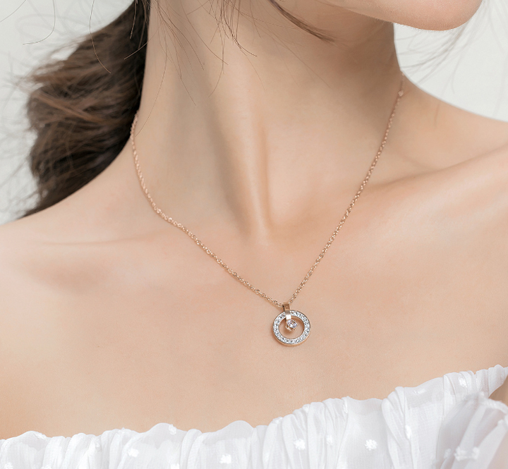DÂY CHUYỀN TITAN ĐÍNH XOÀN ĐÁ TRẮNG & VÀNG