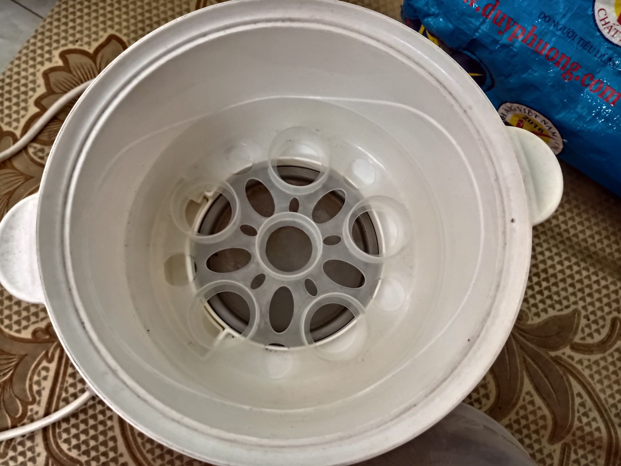 máy tiệt trùng bình sữa
