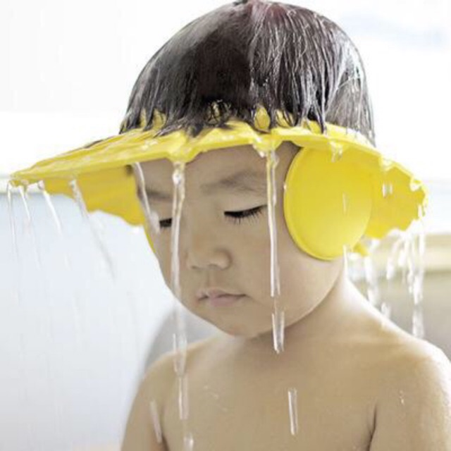 QUÀ TẶNG Nón tắm gội đầu em bé chắn nước, che tai, chống cay mắt
