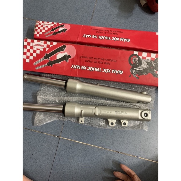 Phuộc trước Lead 110 hàng công ty