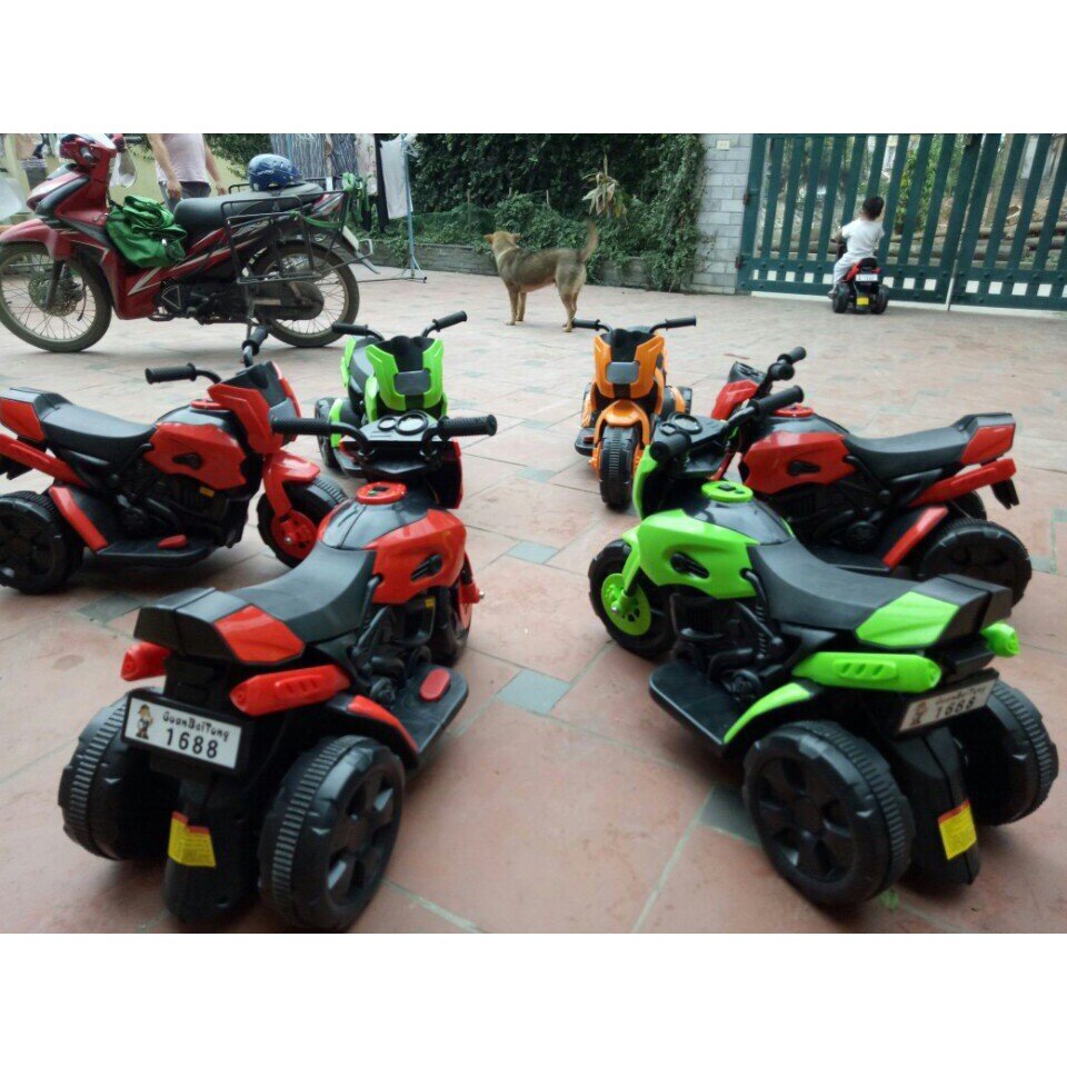 XE MÁY ĐIỆN CHO C BÉ 1688 MÀU CAM