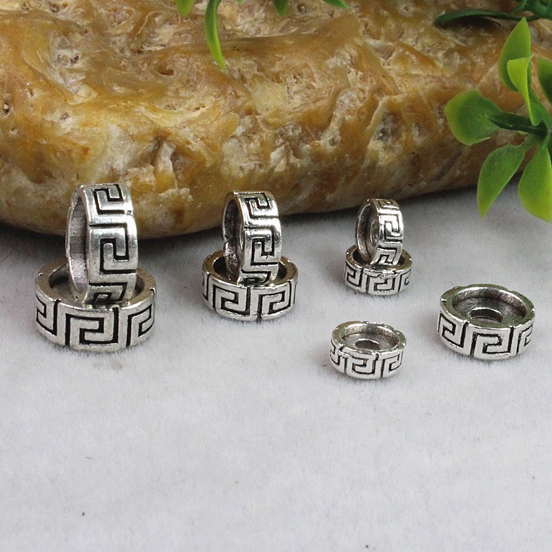 Charm chặn bạc - Hoạ tiết hoa văn