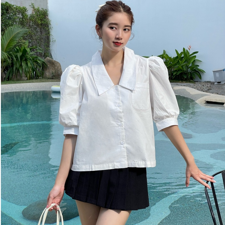 Chân váy ngắn xếp li Tinit Skirt