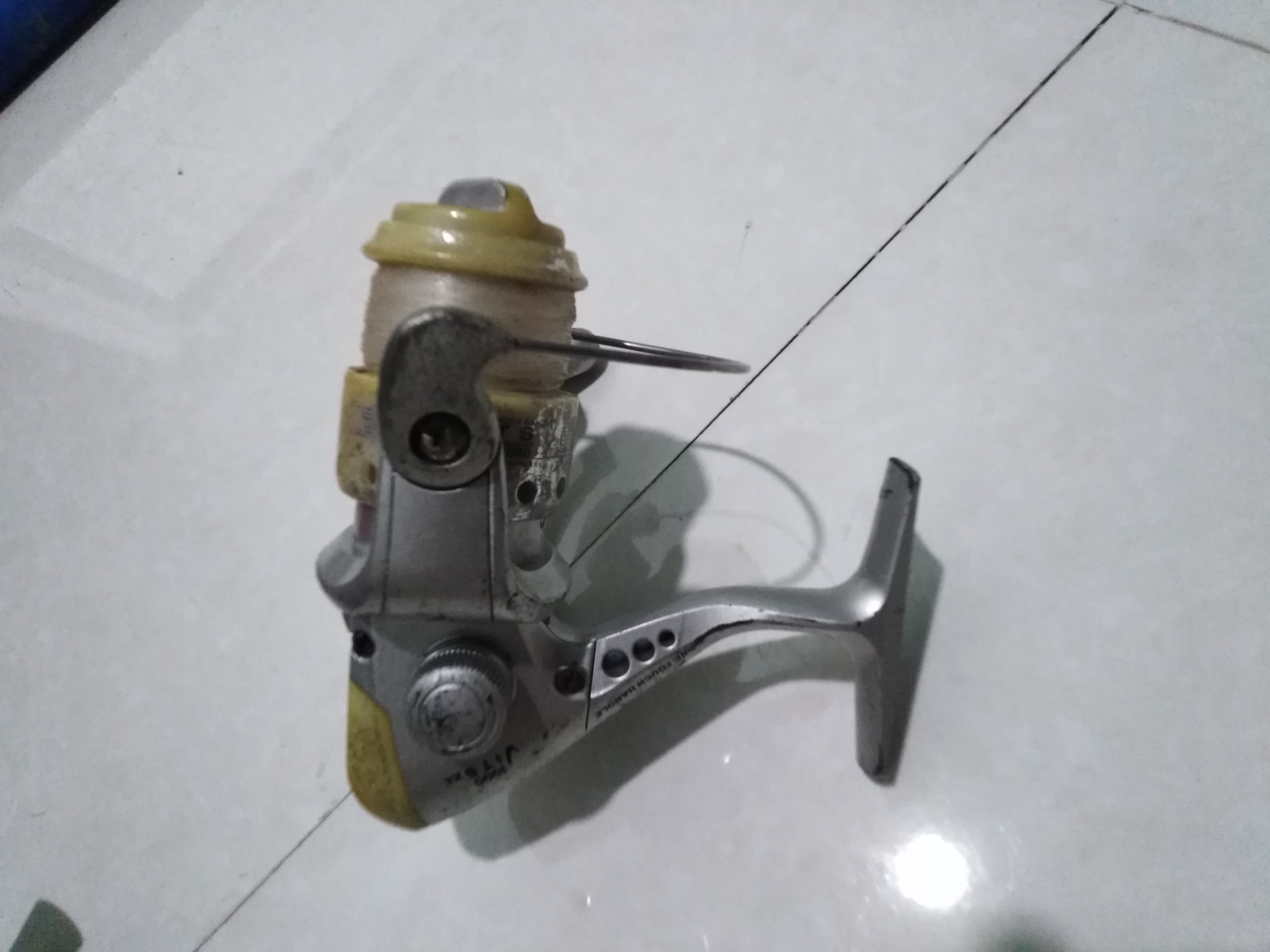 Máy câu bãi nhật one touch handle 1000
