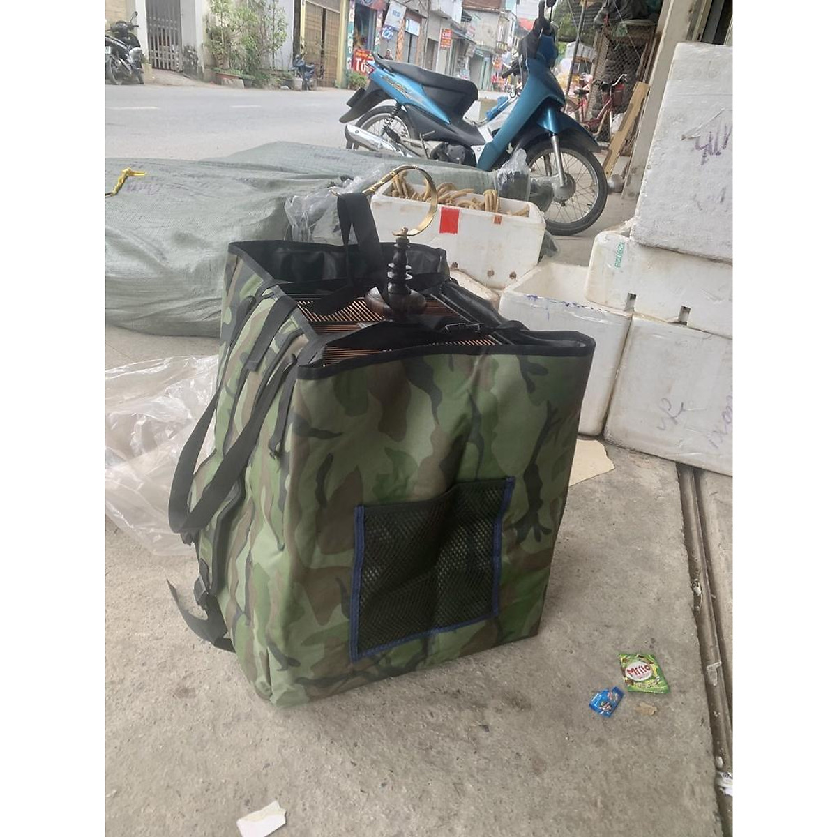 Ba lô đeo lồng chim chào mào