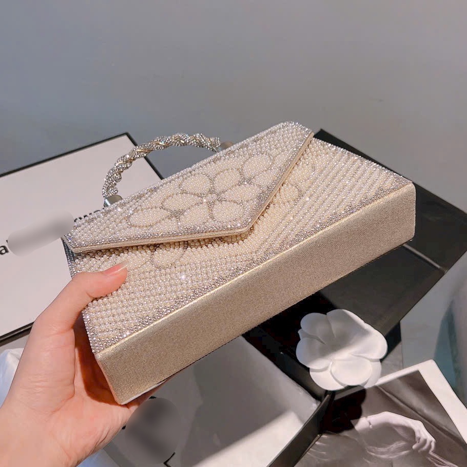 Clutch nữ nạm đá quai xoắn bling bling