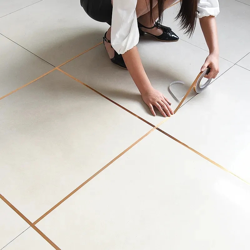 Cuộn băng dán chỉ viền gạch men, tấm ốp PVC