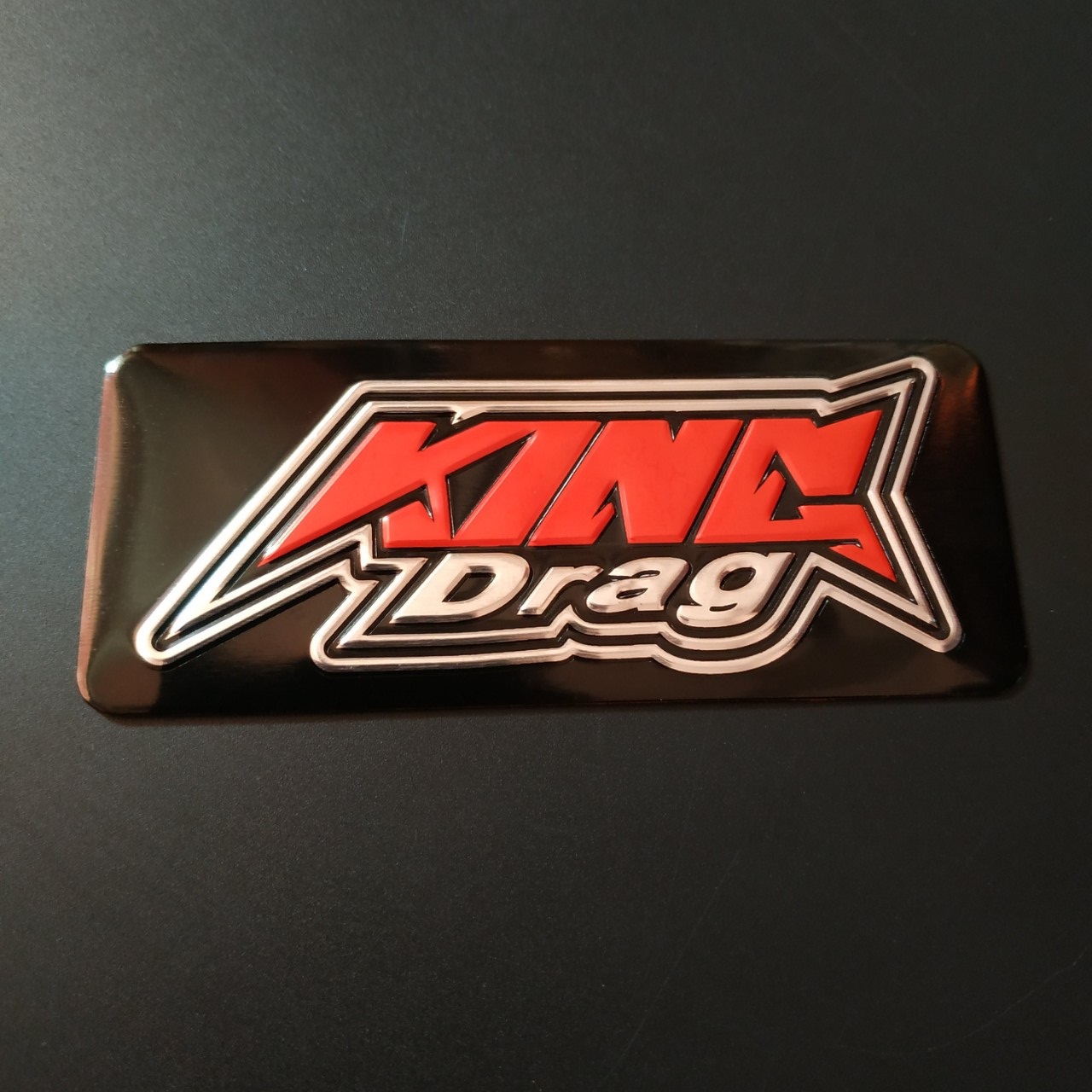 Tem nhôm dán Pô King drag 9.7x4cm