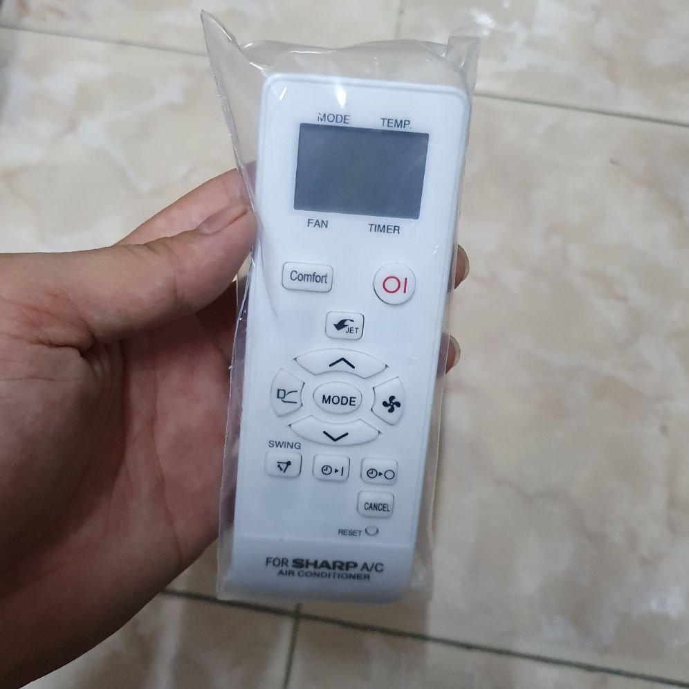 Điều khiển điều hòa sharp trắng
