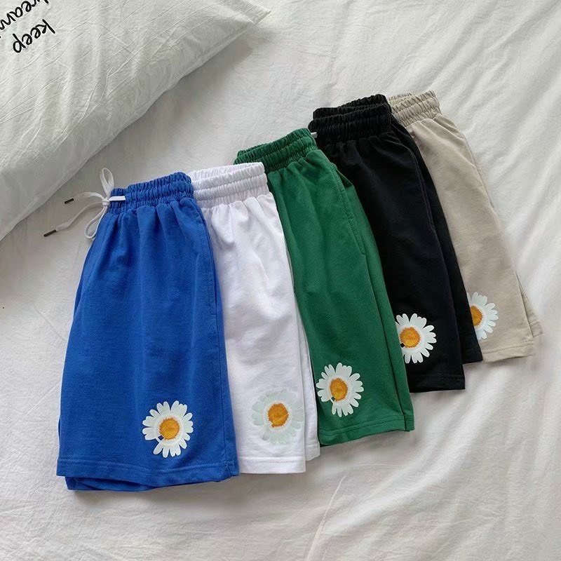 Quần lửng nam nữ in hoa cúc chất liệu thun fom rộng TP