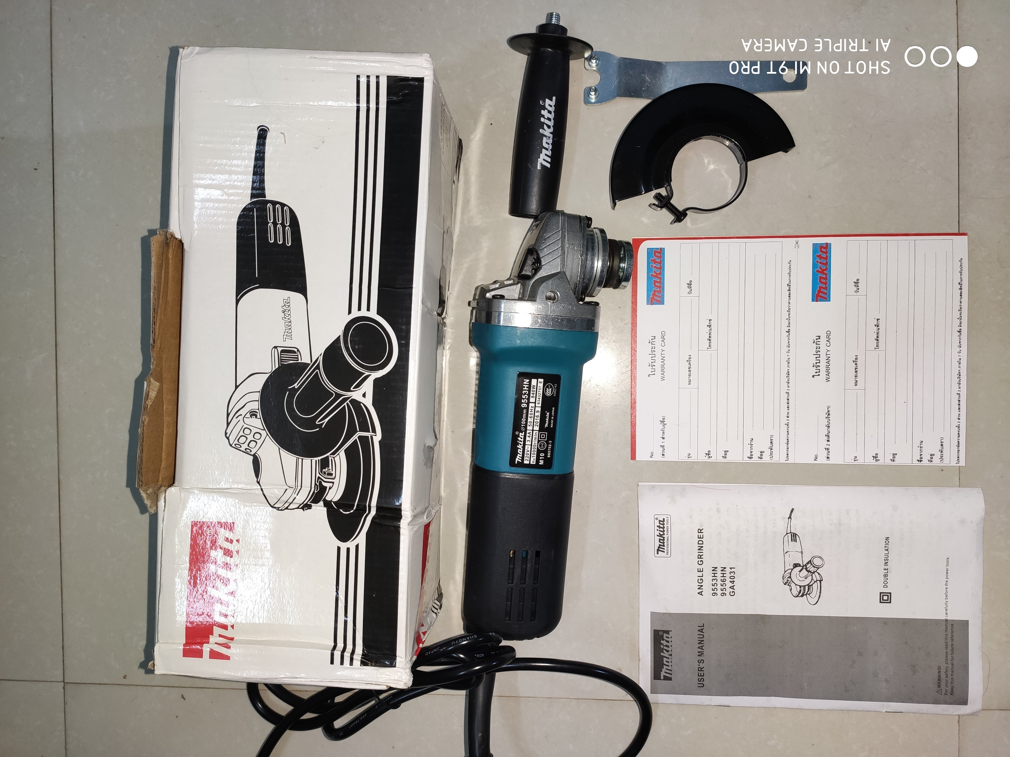 Máy mài góc makita 9553hn, hoặc 9556hn, công tắc cạnh, đá mài 100mm, 840w, made in thailand, đầu máy hợp kim nhôm bóng sáng.