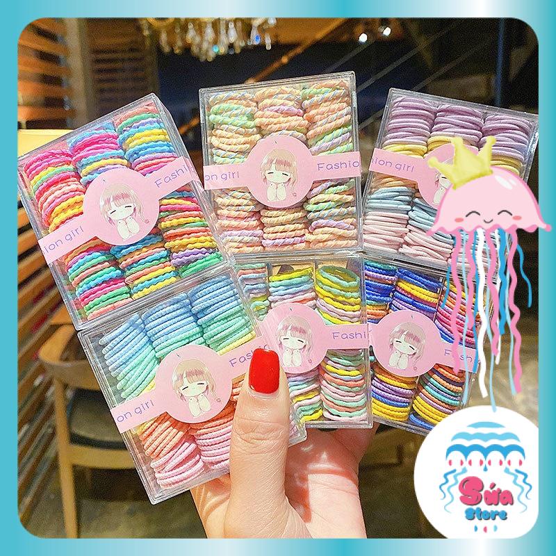 Hộp 100 dây buộc tóc cho bé gái ( Hộp nhựa trong ) dây nhỏ cho bé từ 0 đến 5 tuổi