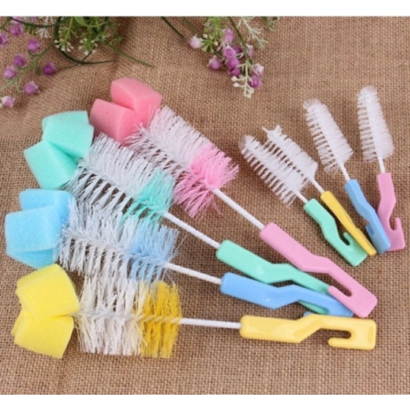 cây cọ rửa bình sữa và núm ti