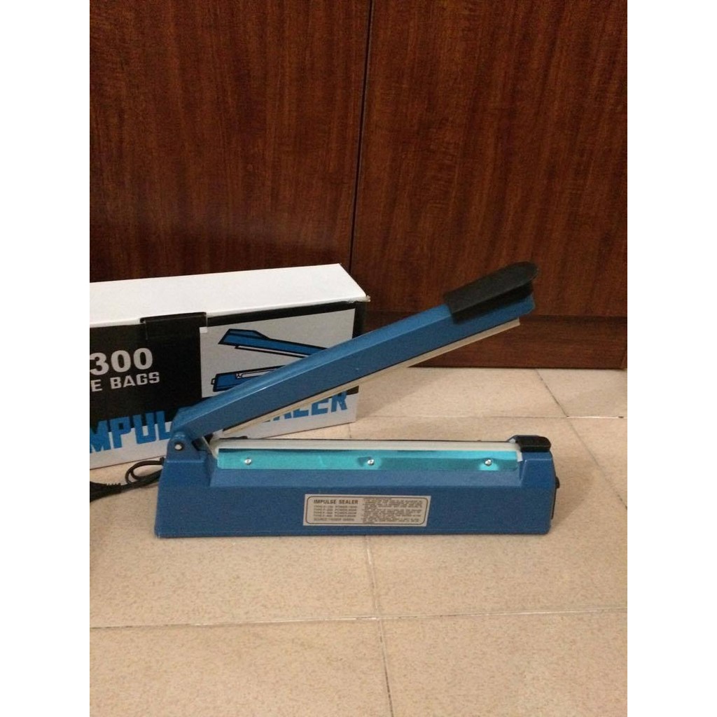 Máy hàn miệng túi 30cm+ 1 thanh dây hàn