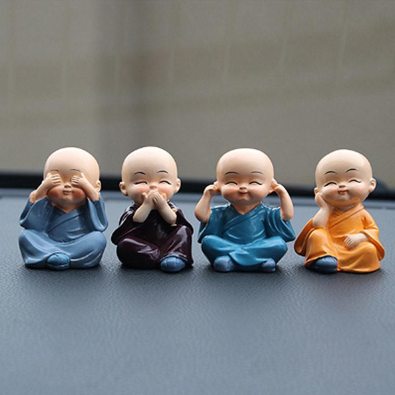 Tượng phật chú tiểu 4 không đá hổ phách