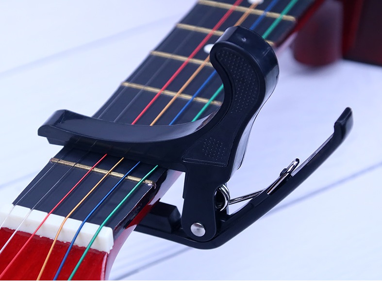 Capo guitar dùng cho đàn guitar acoustic /classic ( capo Kim Loại )