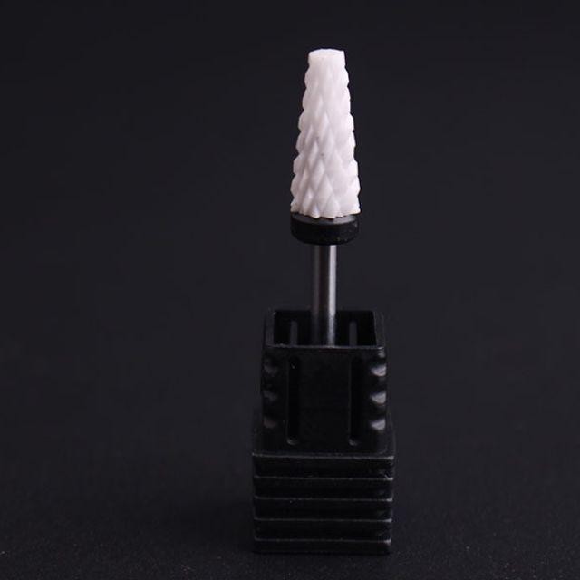 Đầu mài sứ dạng trụ vát.Giúp phá bột , phá đắp gel phá sơn