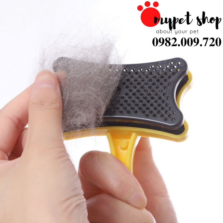 Lược chải lông chó mèo có nút bấm