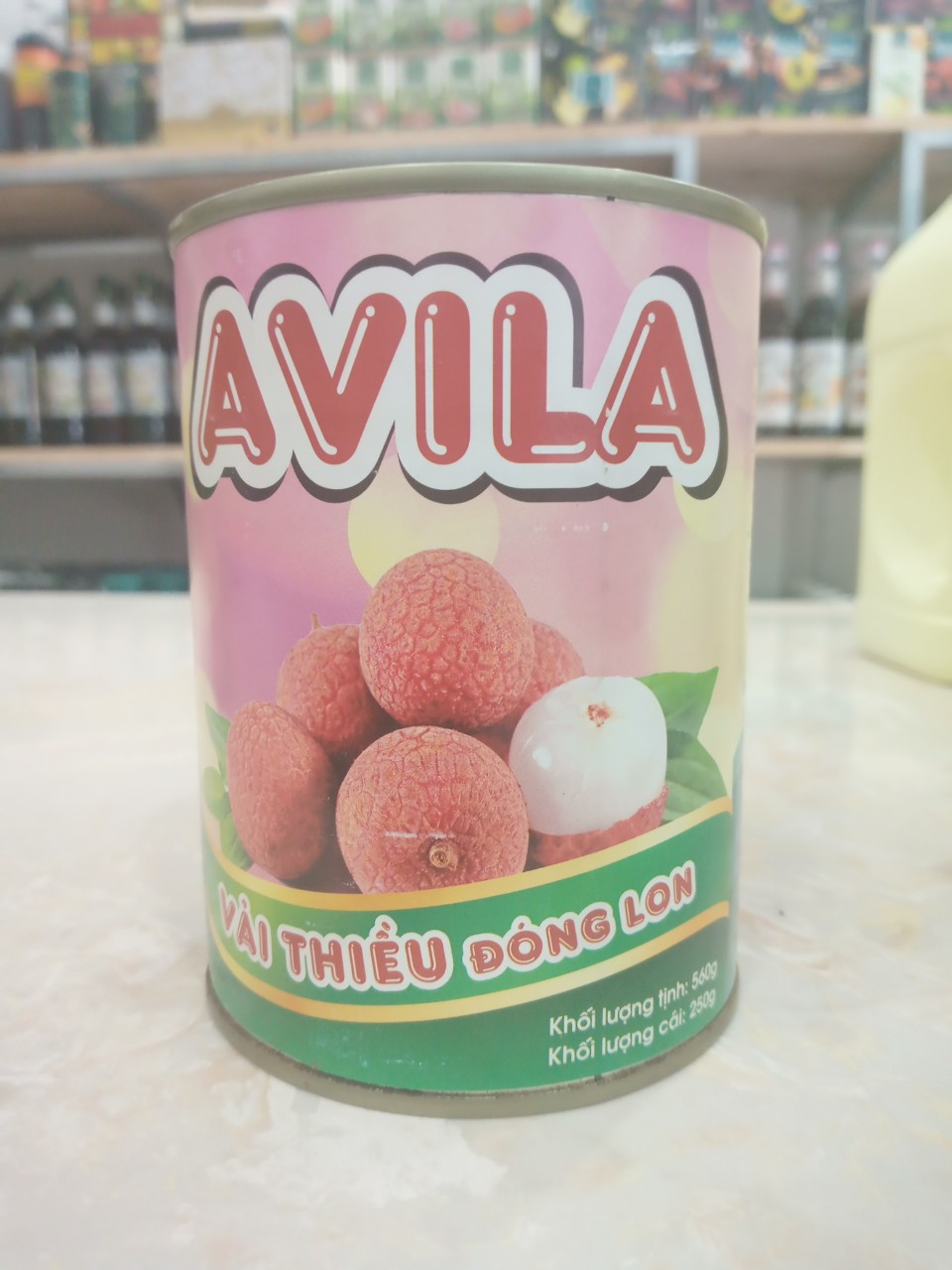 VẢI THIỀU NƯỚC ĐƯỜNG ĐÓNG LON AVILA 560G (LON HỒNG)