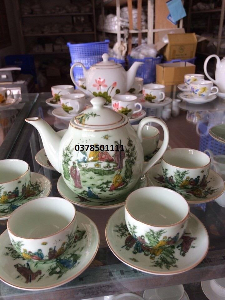 Bộ ấm chén vàng kim vẽ dự tiệc bàn đào