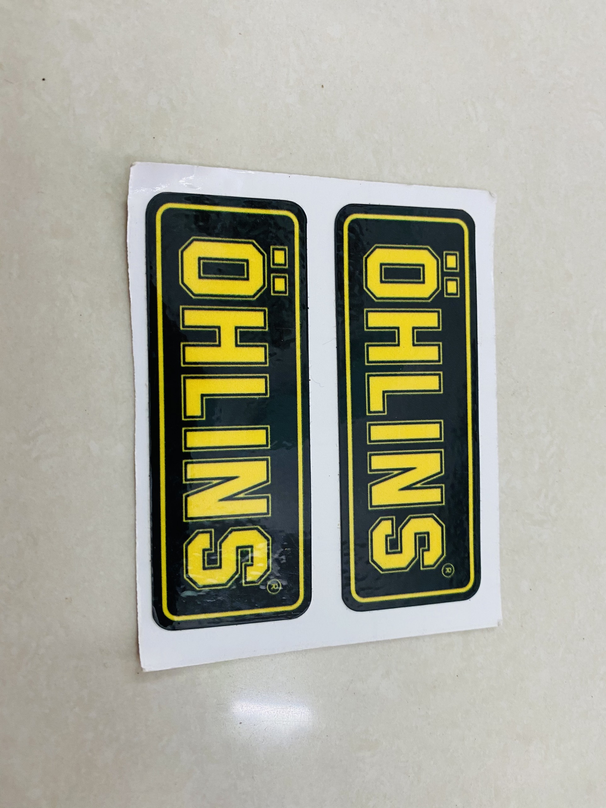 cặp tem ohlins vàng