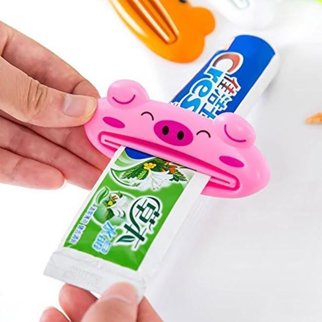 [HCM]Dụng cụ kẹp kem đánh răng hình thú