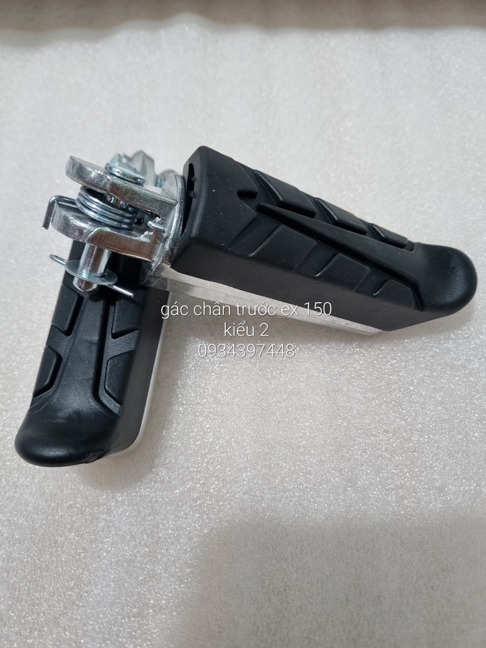 GÁC CHÂN TRƯỚC XE EX 150