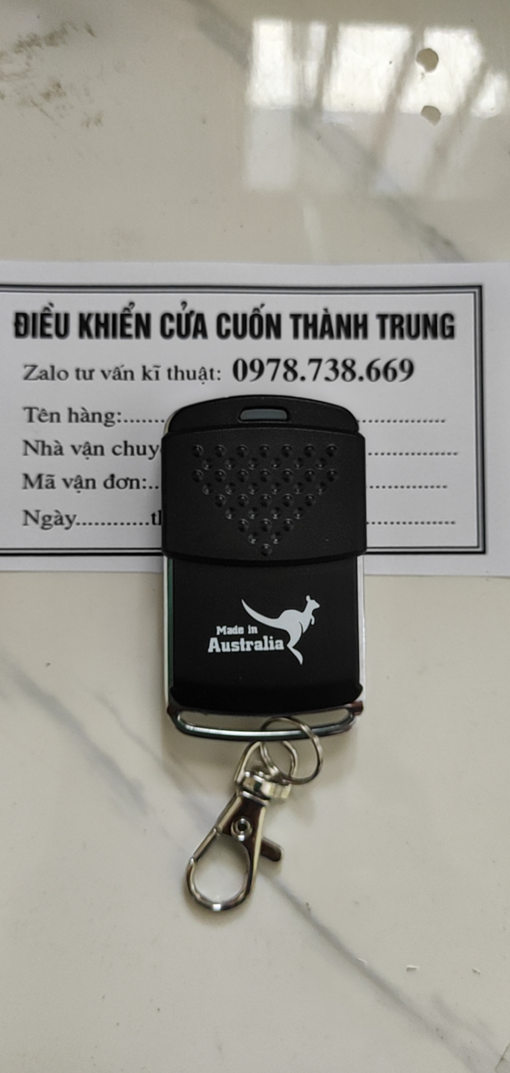 Điều khiển Cửa cuốn Austdoor MÃ NHẢY Tần số 315 Mhz chống sao chép