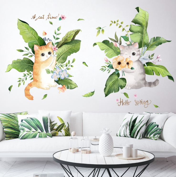 Decal dán tường trăng trí - 2 chú mèo cây chuối hái hoa bắt bướm