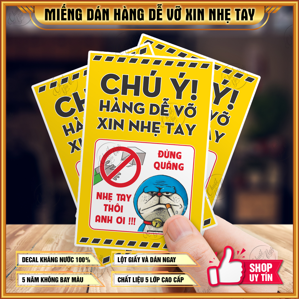 Combo 25 tem dán Chú Ý Hàng Dễ Vỡ Xin Nhẹ Tay nhẹ tai đô rê mon vui nhộn dán hộp hàng vận chuyển