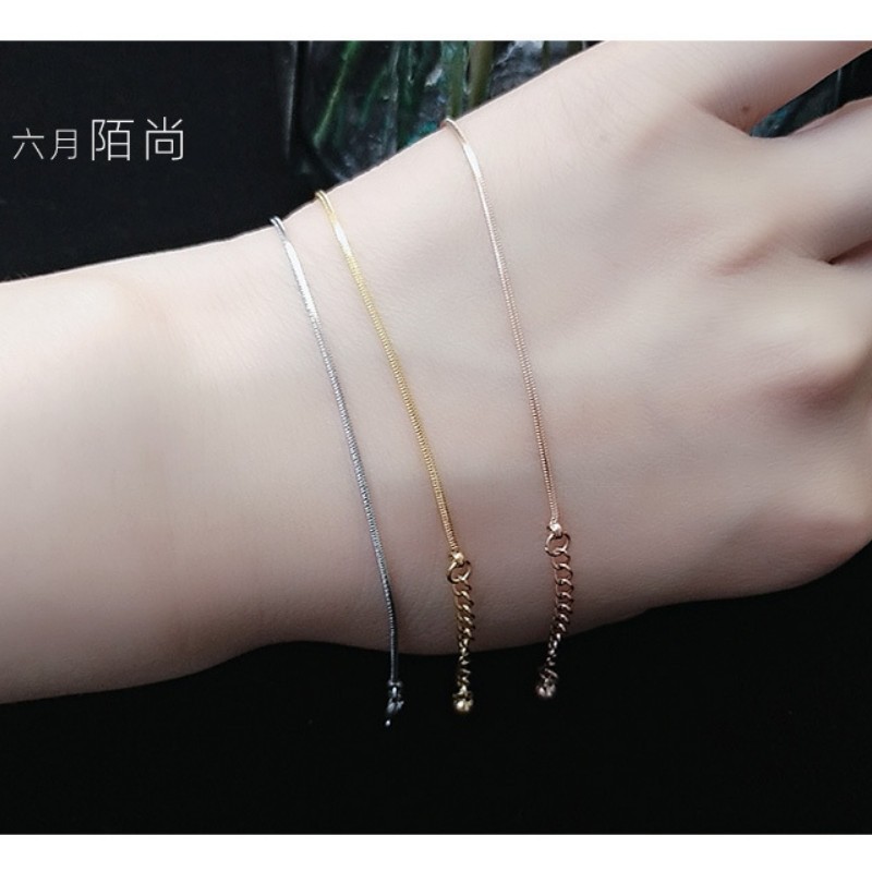 Lắc Tay Nữ Sợi Mì Titan Ko Đen TT 2754