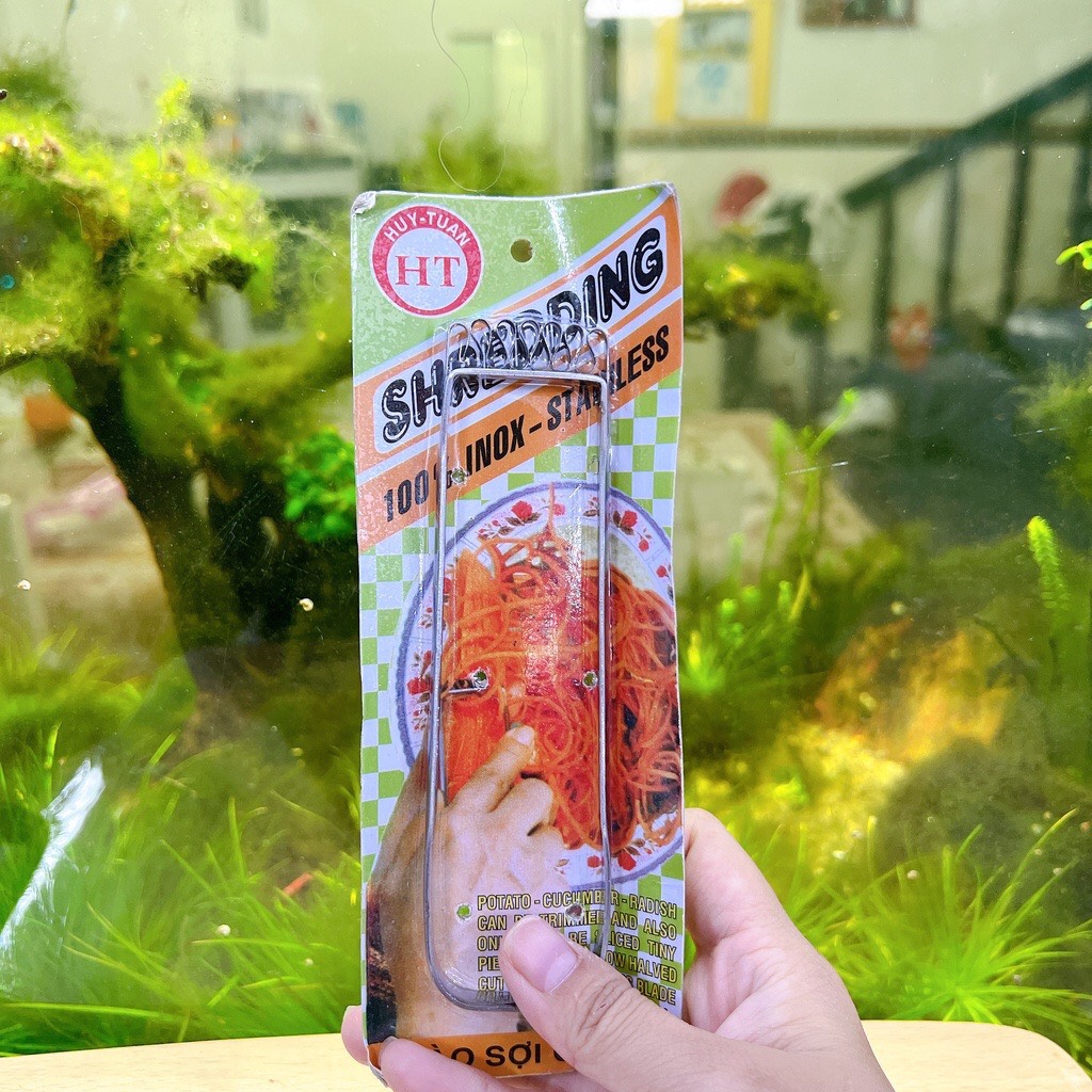 Dụng cụ bào đu đủ thành sợi