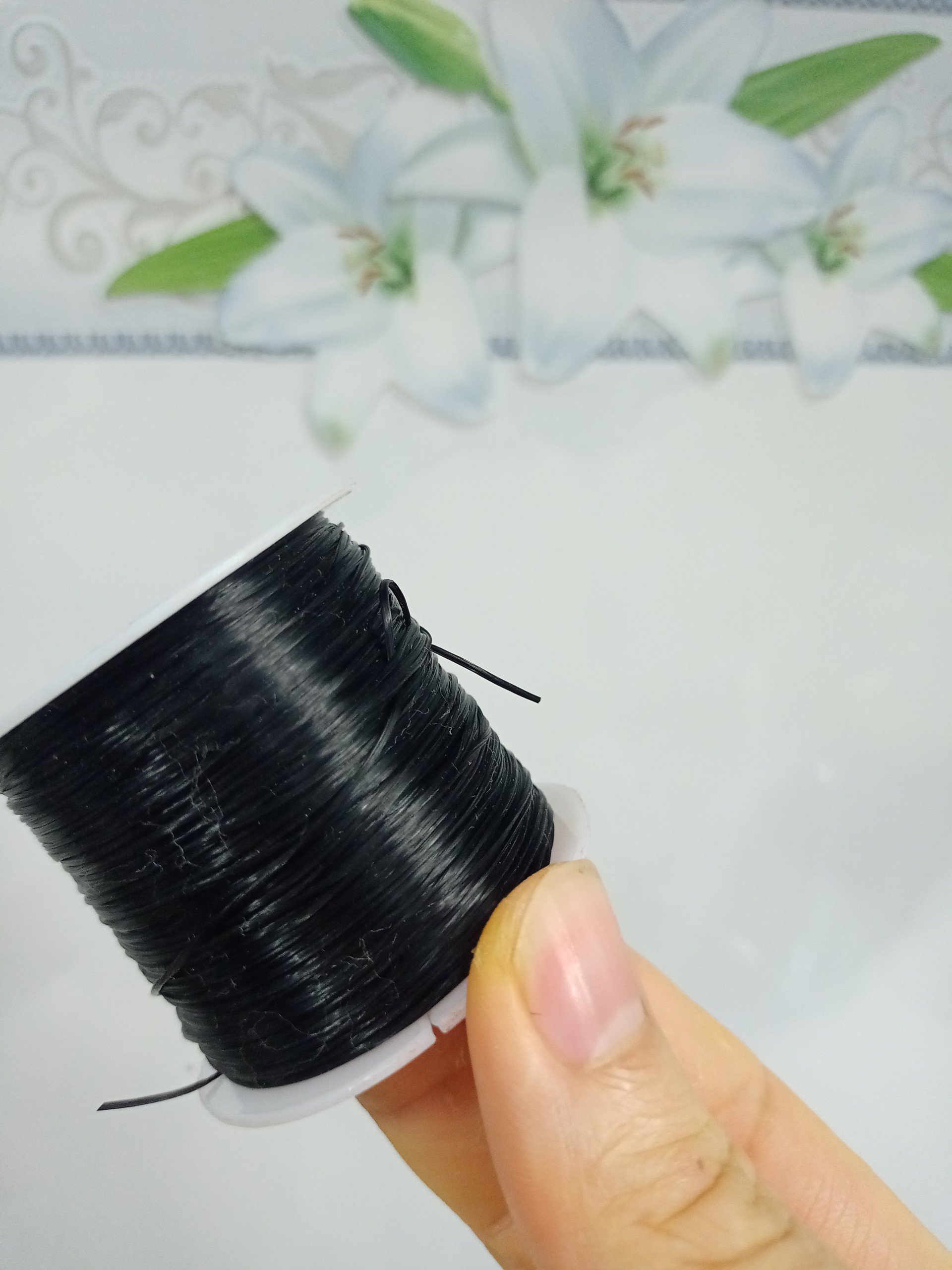 Chỉ cuộn dùng để nối tóc