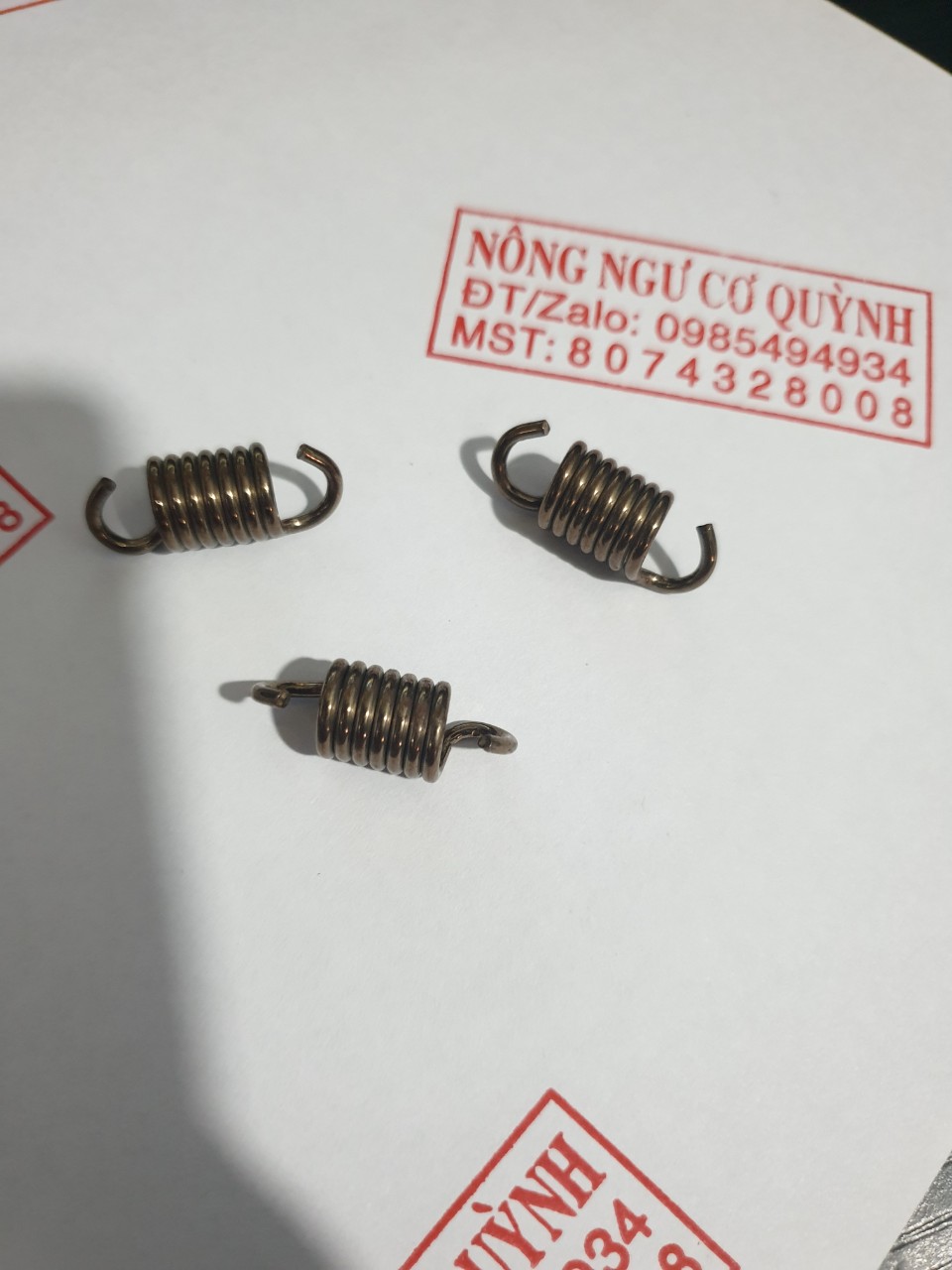 Lò xo bố côn máy cưa xích 361/382