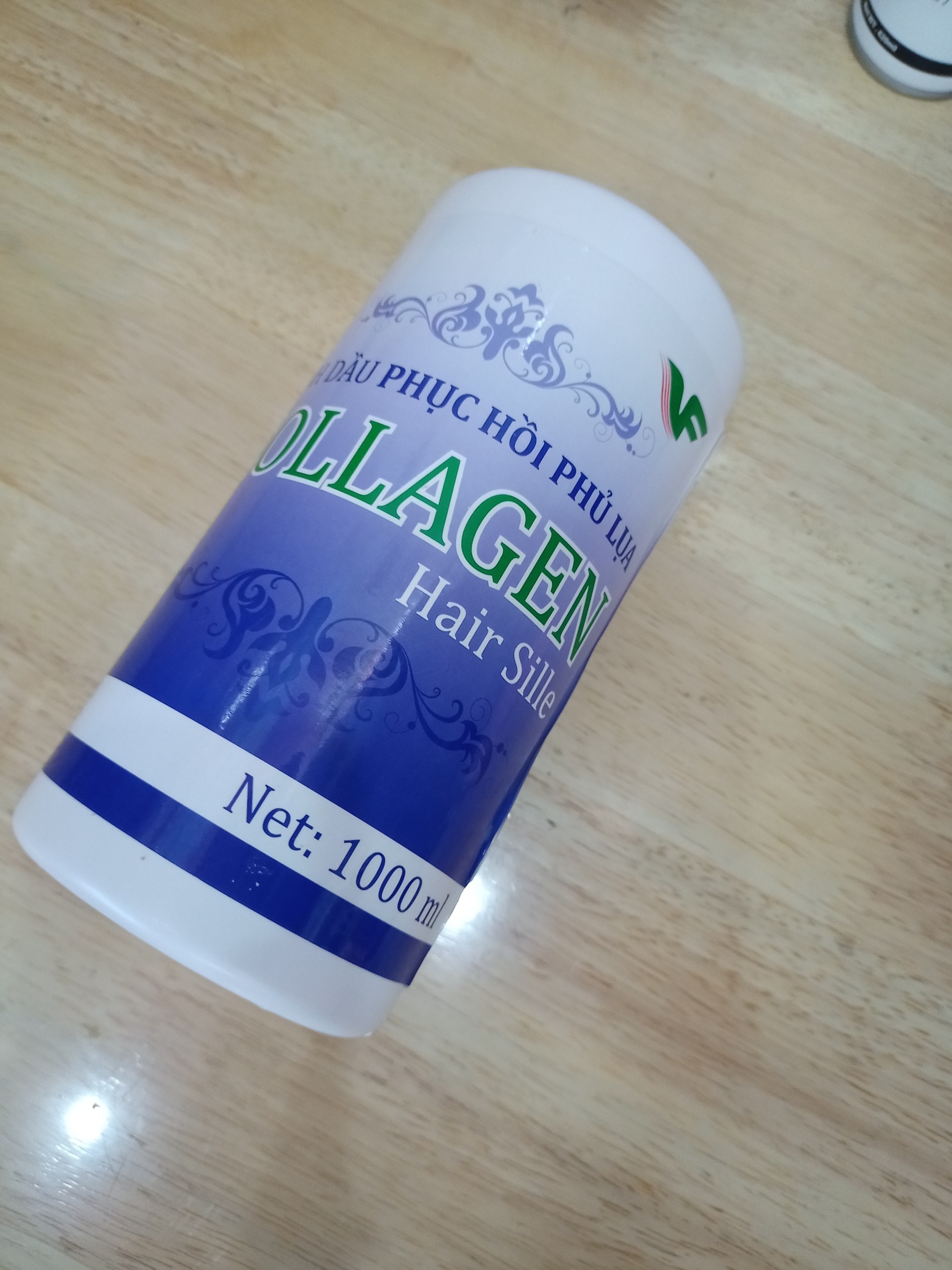 1000ml Tinh dầu phục hồi phủ lụa Collagen  hair sille tím