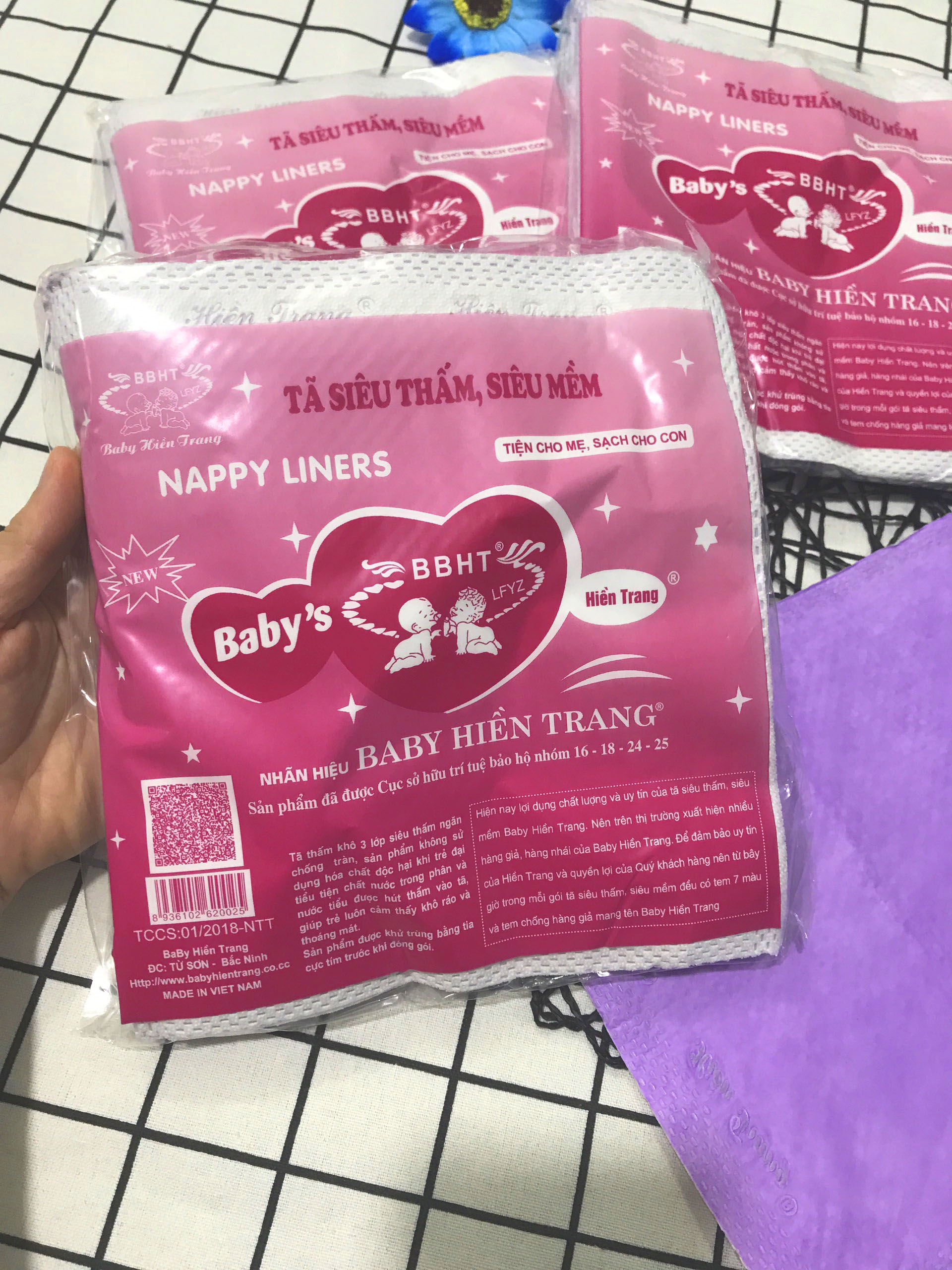 Miếng lót phân su tím cho bé hiền trang gói to