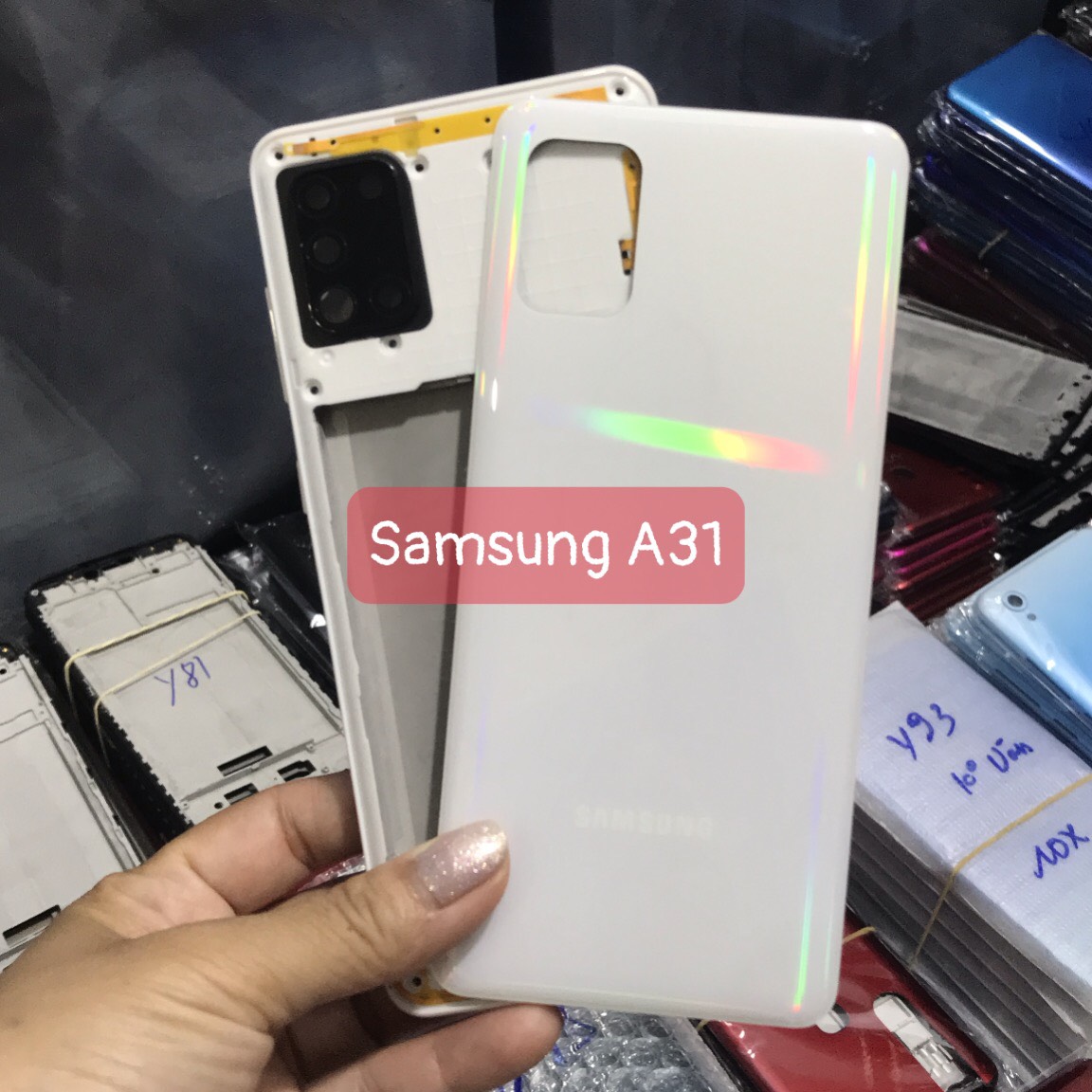 Bộ vỏ samsung A31 zin (bộ gồm lưng,sườn, nút bấm, kính camera)