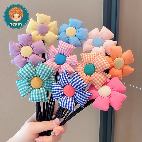 Cột tóc, búi tóc cho bé gái hình bông hoa