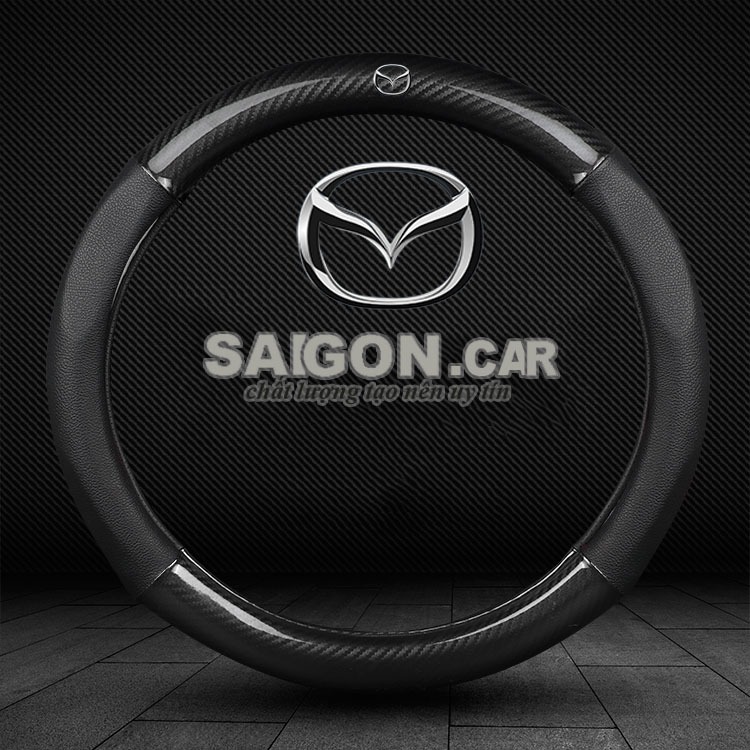 Hcm- bọc vô lăng ô tô, bọc vô lăng da mẫu carbon logo mazda-có đường kính 37-38cm