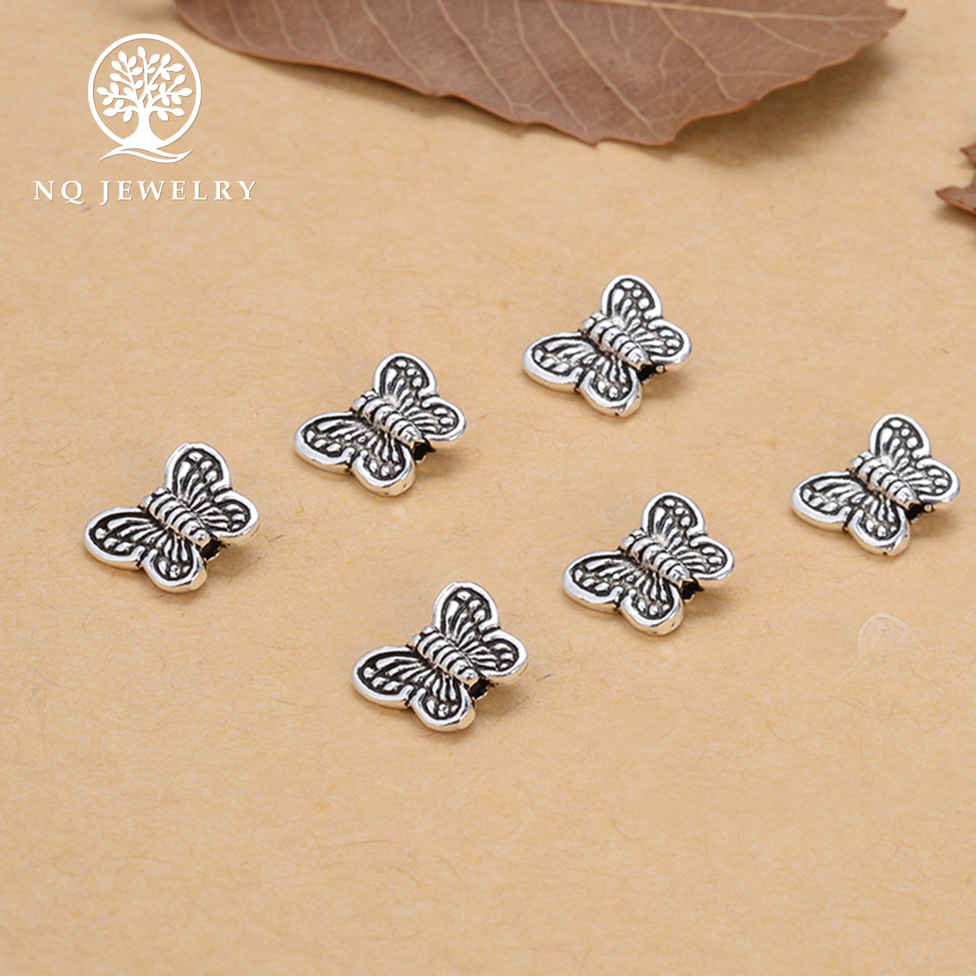 Charm bạc bươm bướm xỏ ngang - NQ Jewelry