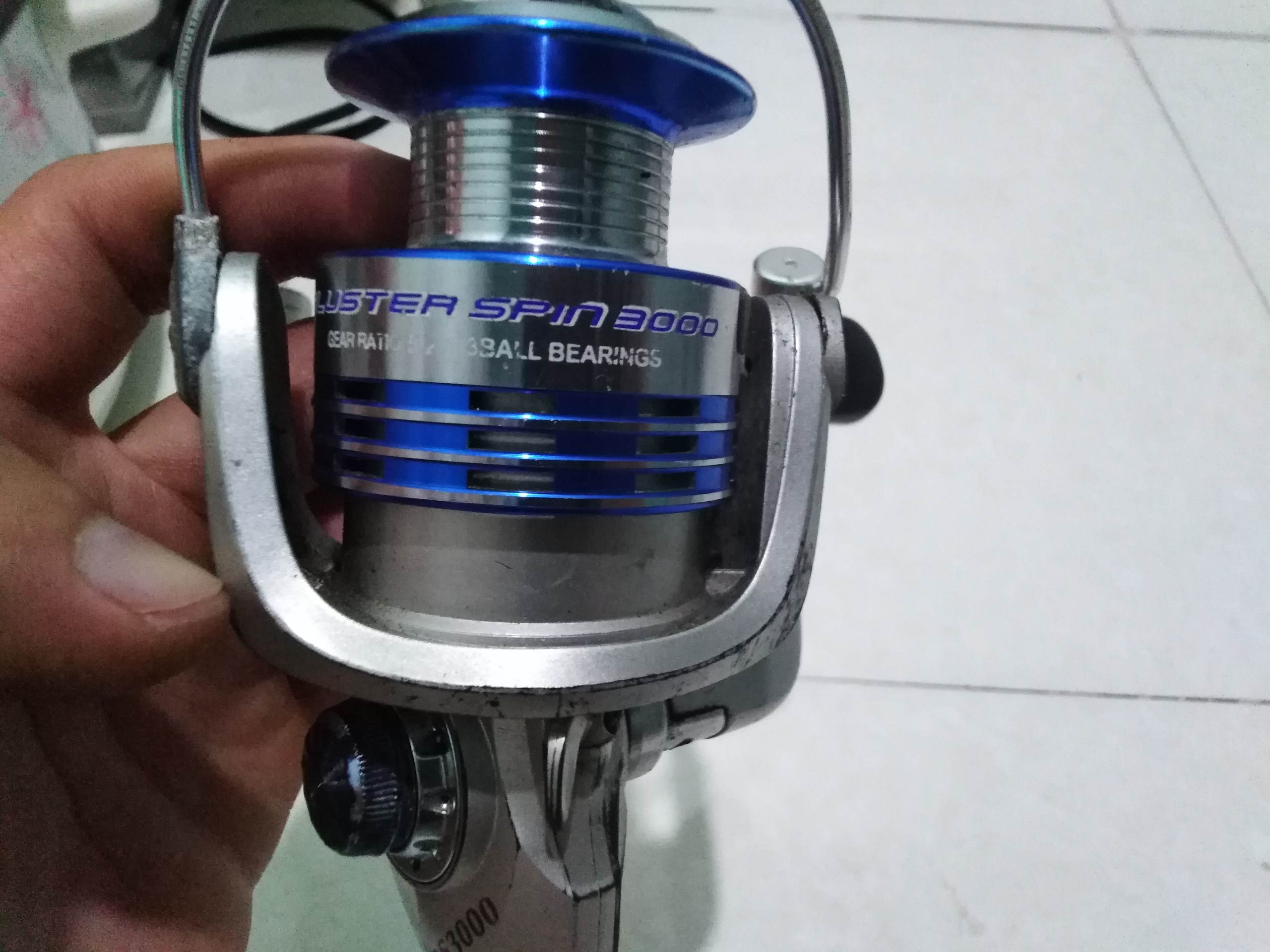 Máy câu bãi nhật Bluster spin 3000 cối kim loại