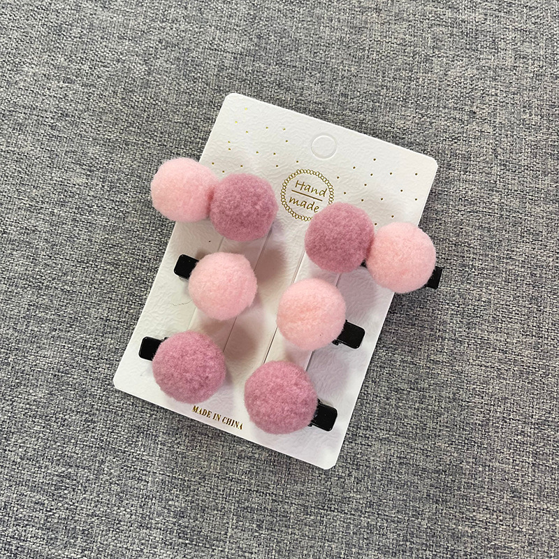 set 2 kẹp tóc pon pon cho bé .
