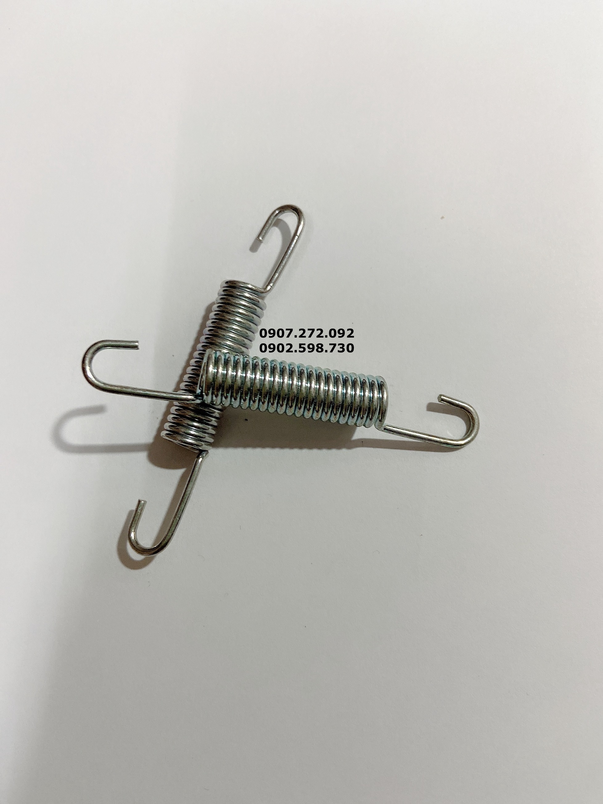 LÒ XO THÉP MÓC PÔ LON PÔ ĐỘ ( 2 CÁI ) (MỚI)