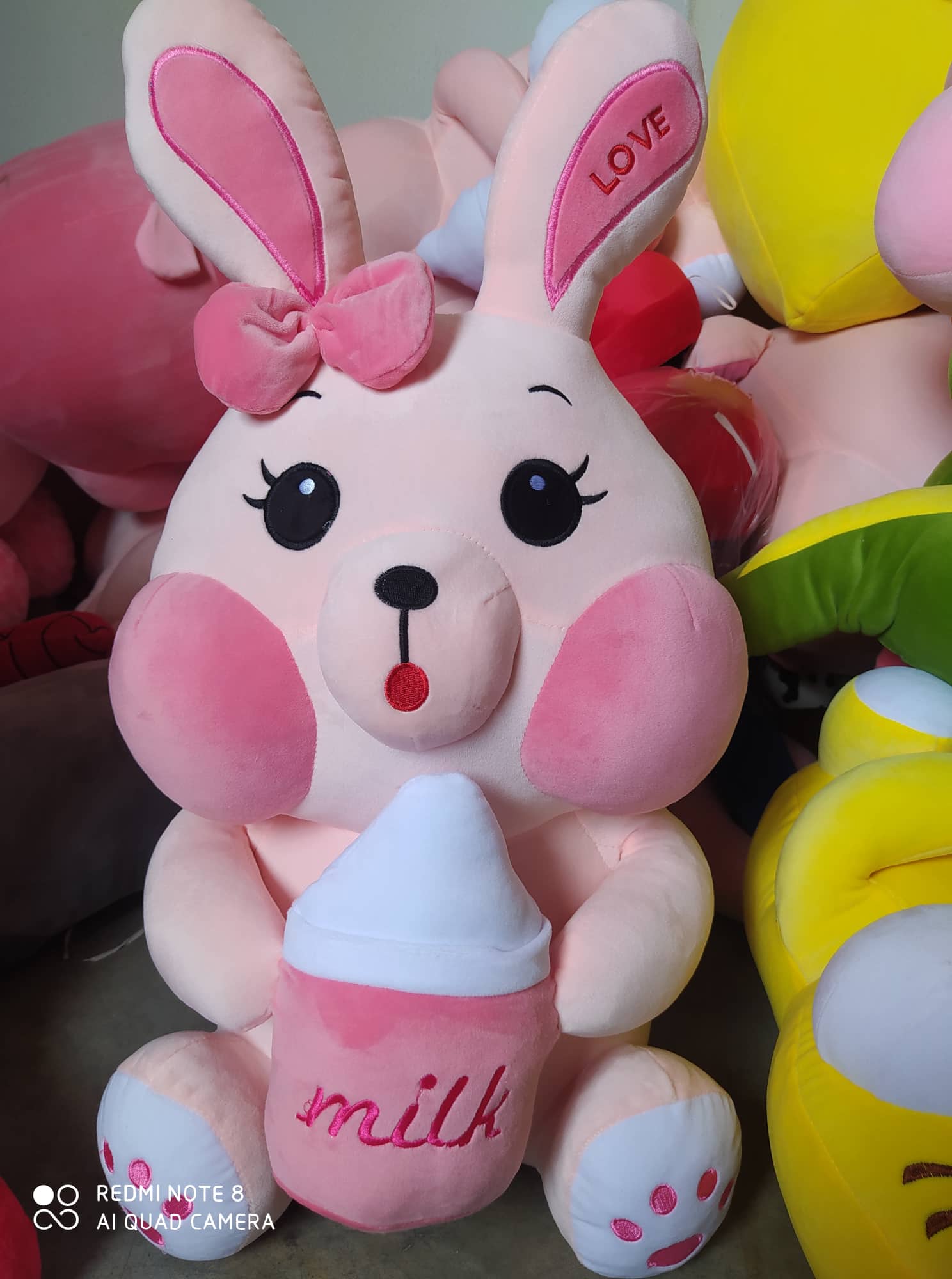 Gấu bông thỏ bông Thỏ ôm bình sữa